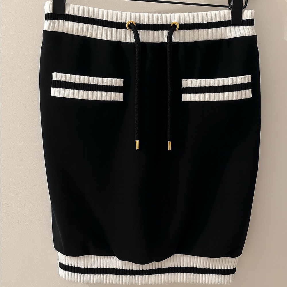 Moschino Couture Black Text on White Label